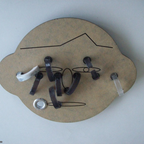 “Ring Pierced Face” (Exchange Puzzle IPP 25)