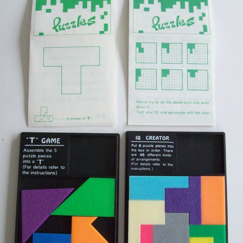 2 Lonpos puzzles, 5 piece T Game and 8 piece IQ Creator