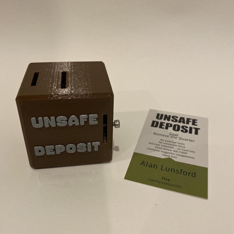 Unsafe Deposit - Trapped Coin Mechanical Puzzle by Alan Lunsford