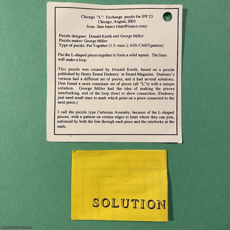 Chicago L, IPP23 (2003) exchange puzzle designed by Donald Knuth
