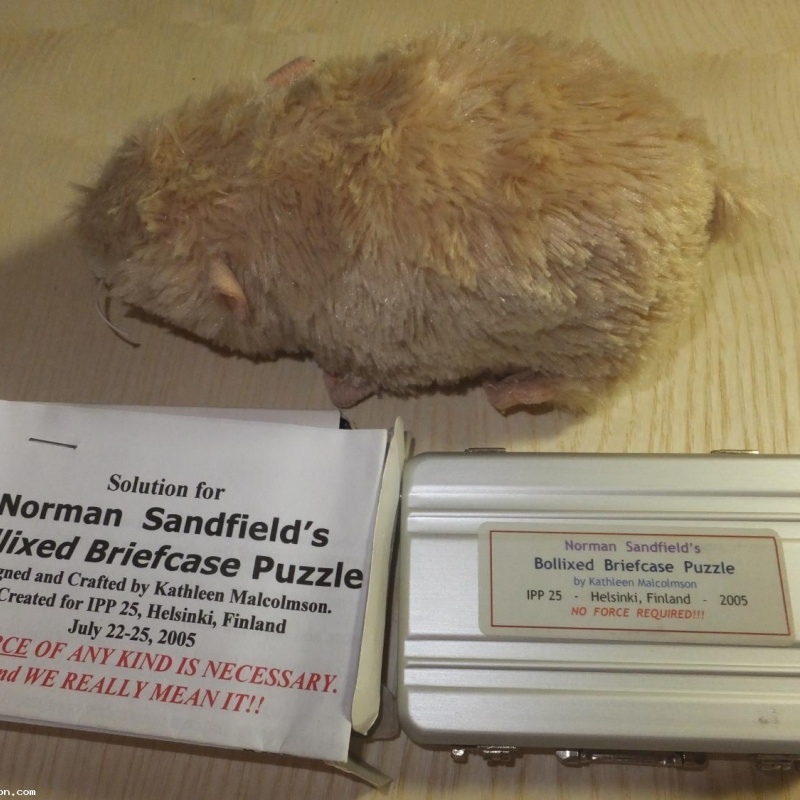 Norman Sandfield's Bollixed Briefcase Puzzle