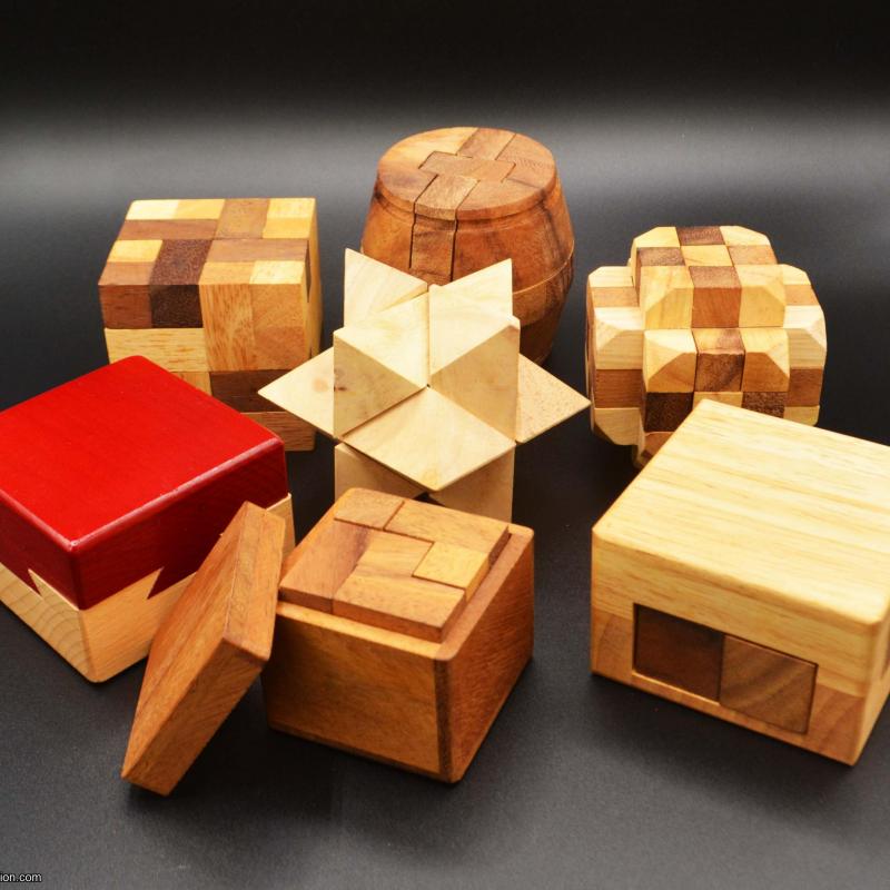 Lot of 7 Wooden Mechanical Puzzles