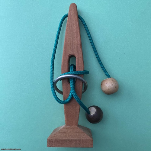 Eye of the Needle IPP20 (2000) exchange puzzle by magician Wally Lee