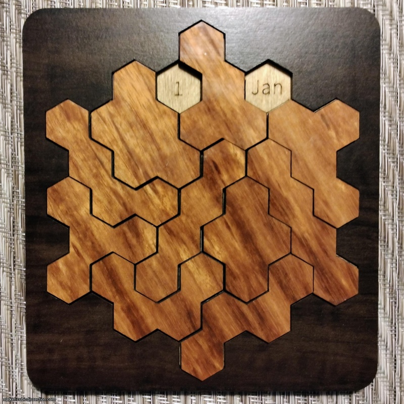 Shiura's Daily Hex (calendar packing puzzle)