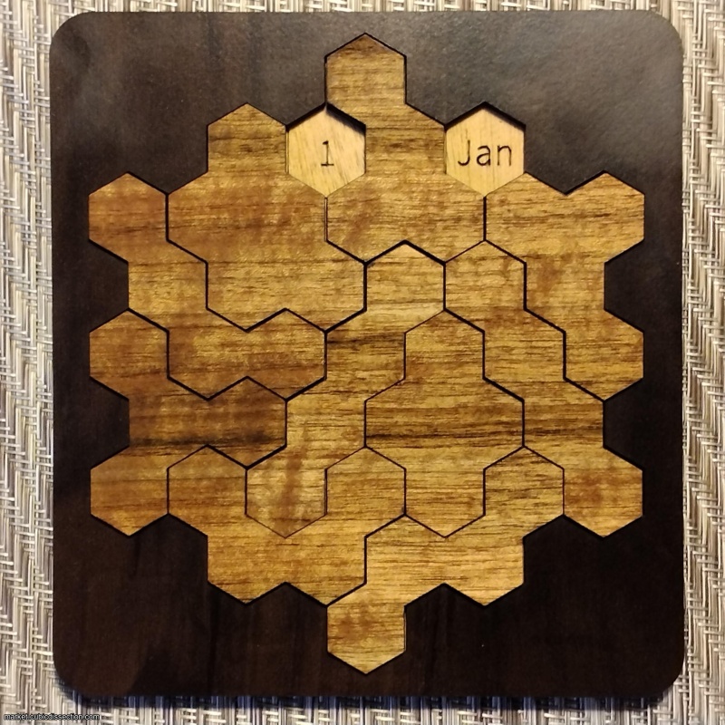 Shiura's Daily Hex (calendar packing puzzle)