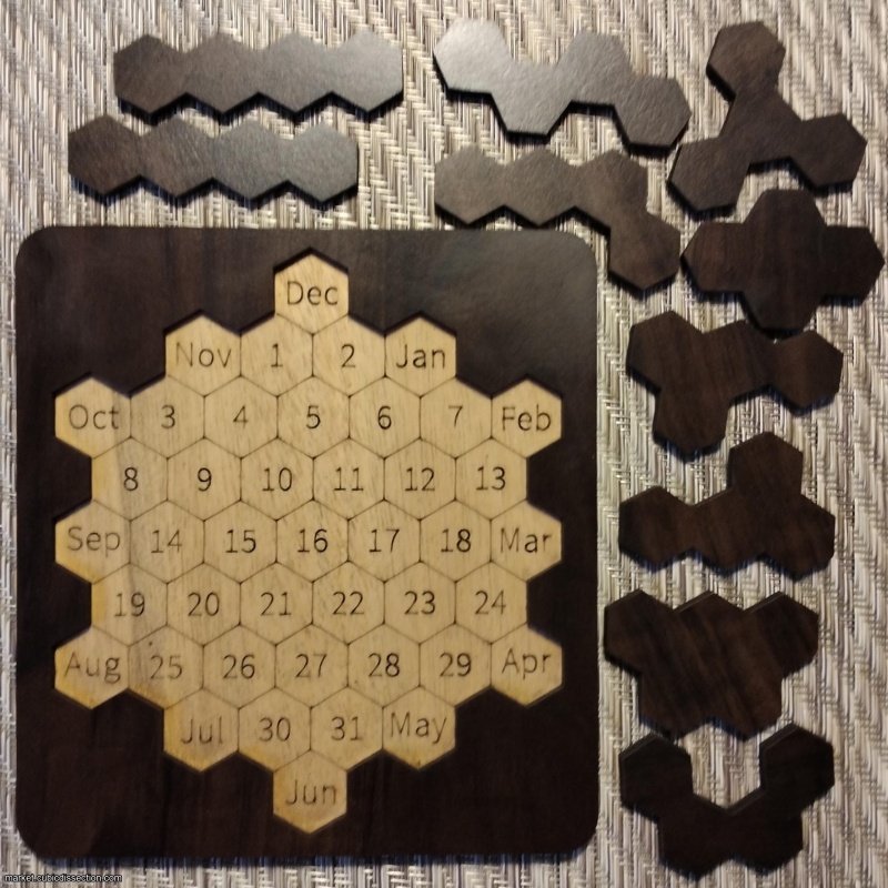 Shiura's Daily Hex (calendar packing puzzle)