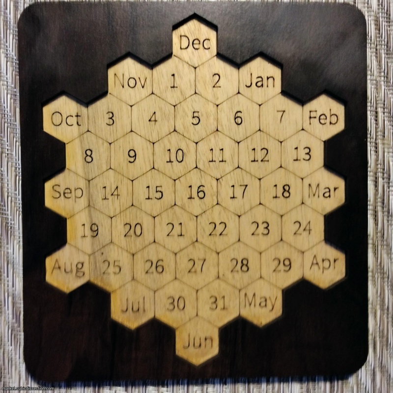Shiura's Daily Hex (calendar packing puzzle)