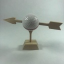 Arrow Through Golf Ball