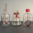 Lot of 3 Puzzle Bottles - Eureka