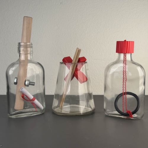 Lot of 3 Puzzle Bottles - Eureka