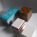 A small lot of pieces built into puzzle boxes