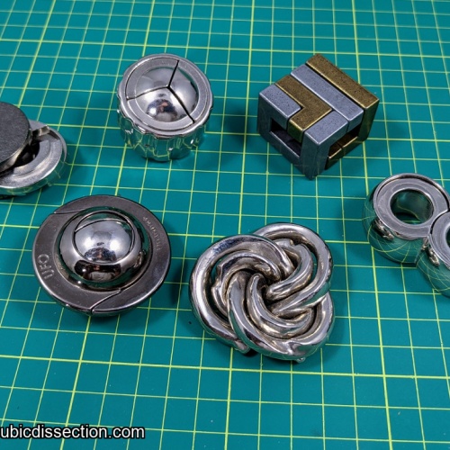 group lot of Hanayama puzzles.