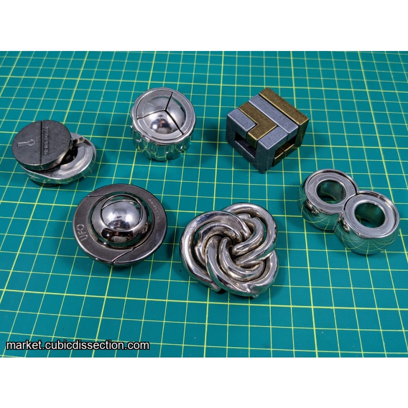 group lot of Hanayama puzzles.