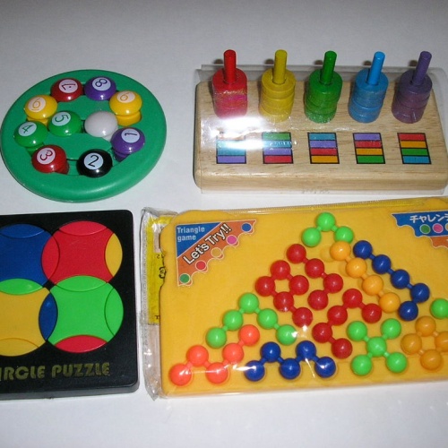 Four puzzles; Hoops, Circle Puzzle, Triangle Game, and other