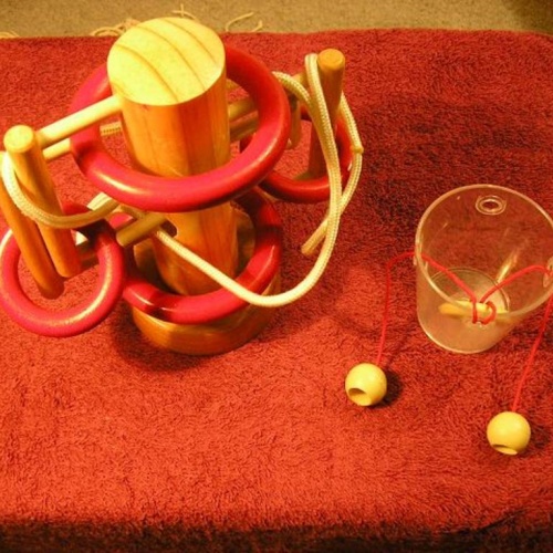 Pair of disentanglements - B&P Dutch String Puzzle plus unknown