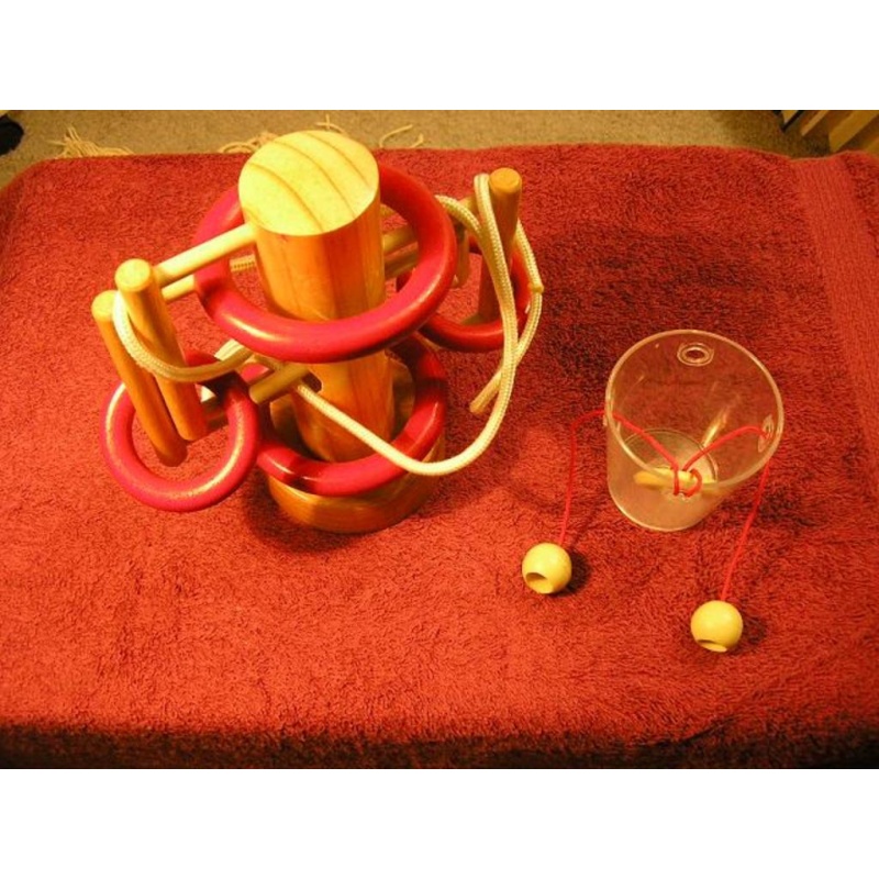 Pair of disentanglements - B&P Dutch String Puzzle plus unknown