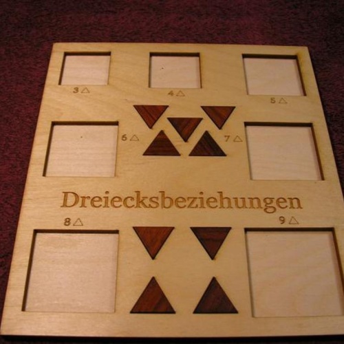 Dreiecksbeziehungen tray puzzle - triangle packing