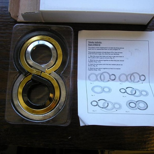 Threebus Moebius and Trinity Infinity Metal puzzles, Doug Engel