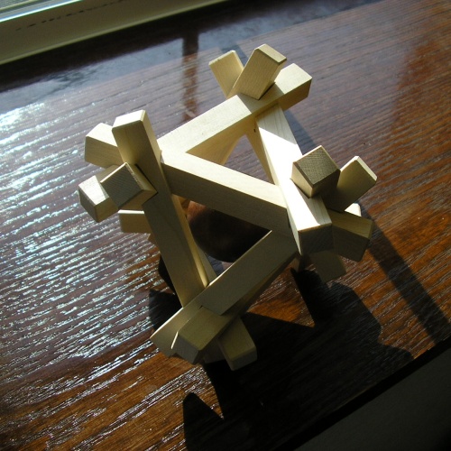 Ball in 12 piece cage