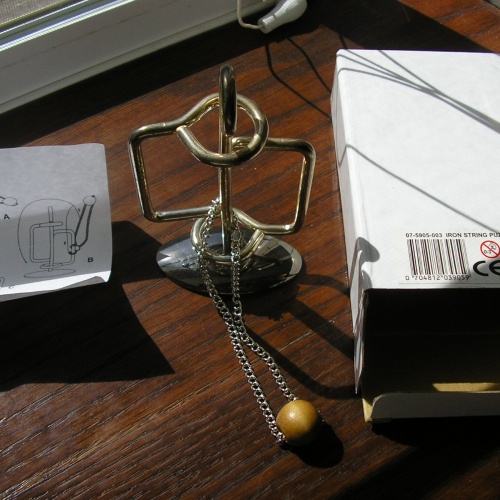 Iron String Puzzle Post Haste
