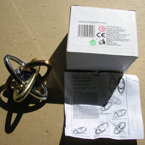 EZ Atom metal puzzle, design Doug Engel, mfg Bits and Pieces