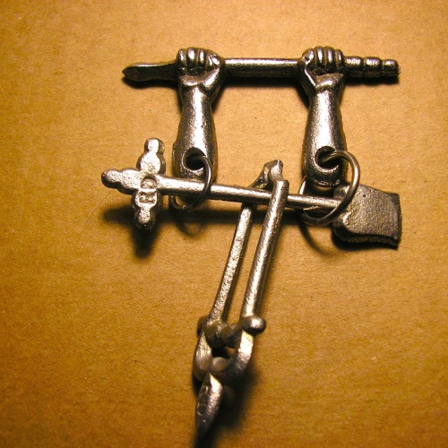 Fire Iron puzzle, cast iron, 1900-1920