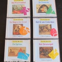 lot of 6 tangrams in jewel cases