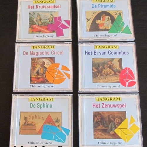lot of 6 tangrams in jewel cases